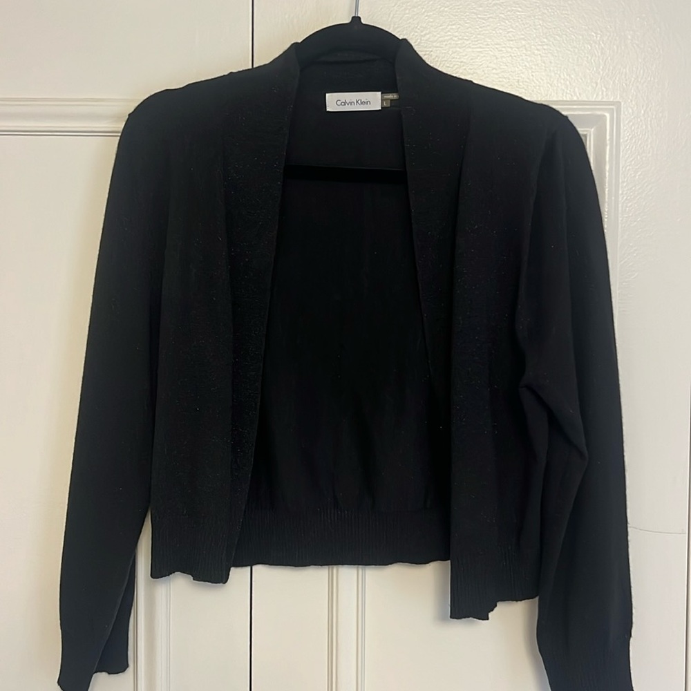 Calvin Klein shrug with light shimmer